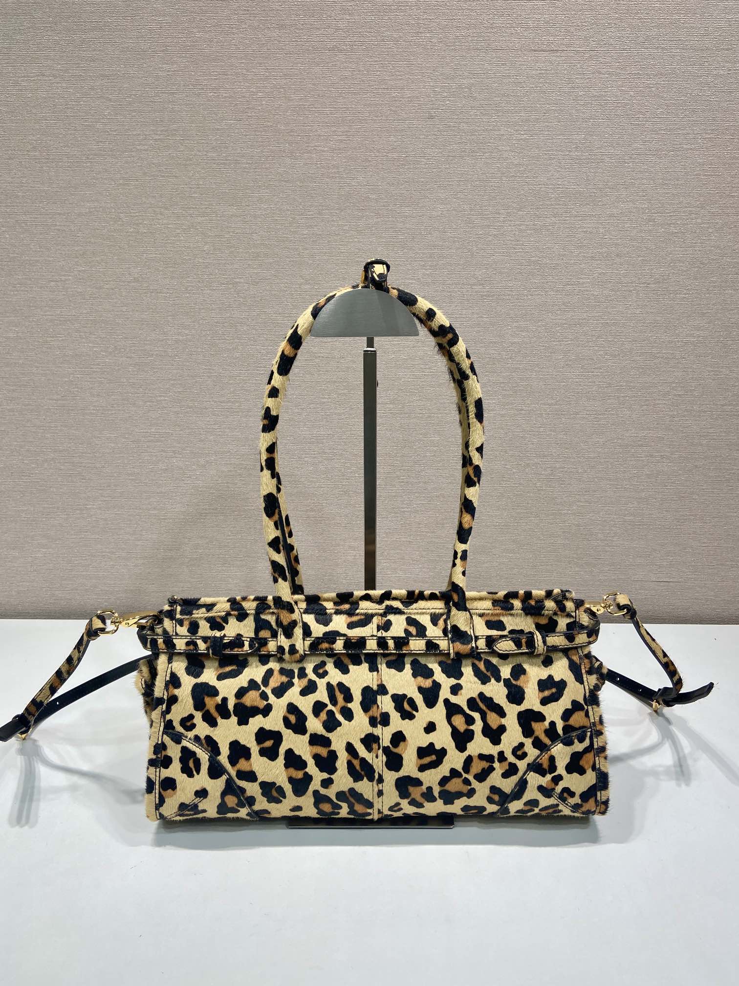 SAC POIGNÉE 32 EN CUIR IMPRIMÉ LÉOPARD